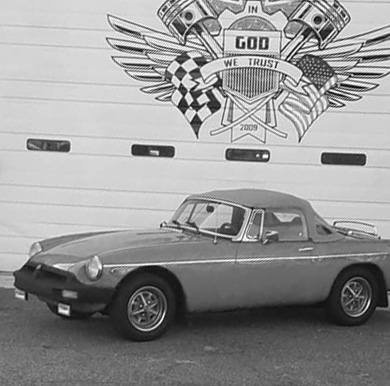 classic car parked in front of GeorgiaLina Automotive service bay